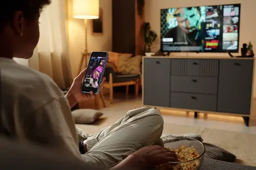Is Your Phone Ruining The TV Experience? The Truth About Double-Screening And What We’re Missing