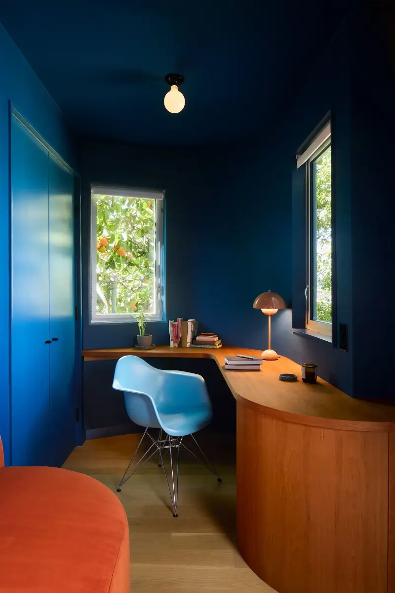 Even the orange-toned wood in this office has a warming and grounding affect in the room.  (Image credit: Laun Los Angeles/Ye Rin Mok)