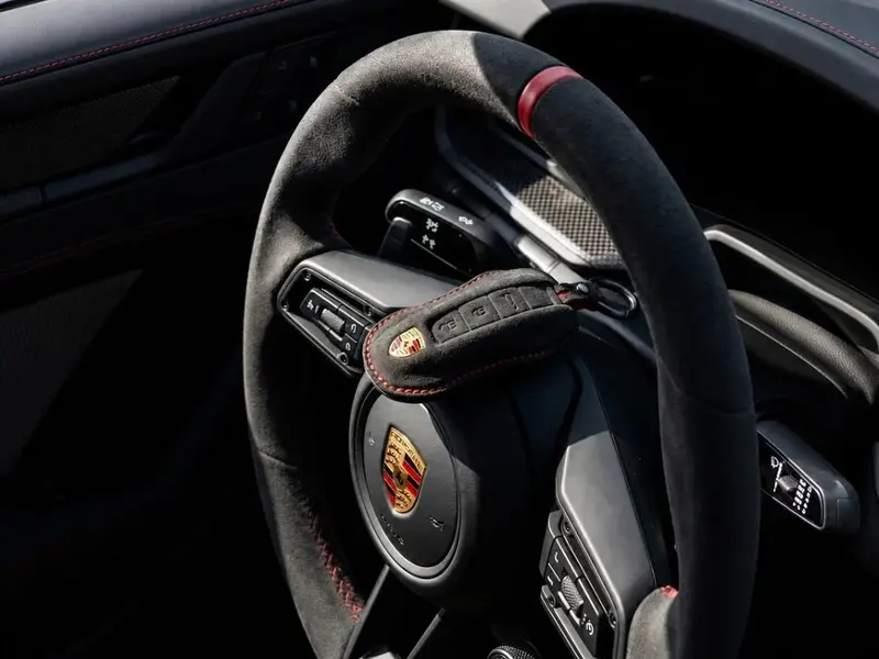 porsche key steering wheel.jpeg