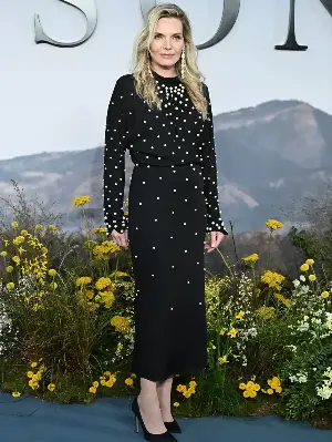 Michelle Pfeiffer says motherhood provides balance in her life