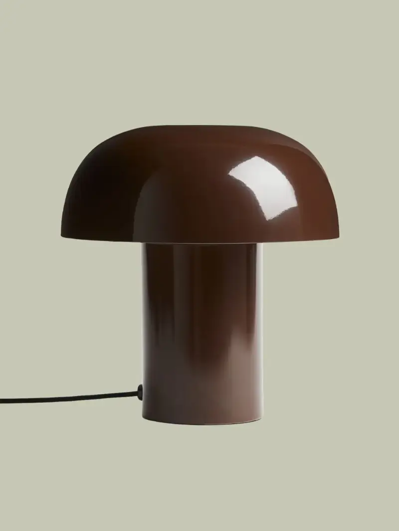A dark brown metal table lamp from H&M