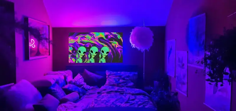 Introduce opalescent or chrome finishes, art, throw pillows, and decor with abstract shapes, starfields, or planetary motifs, which reinforce the theme without overpowering.