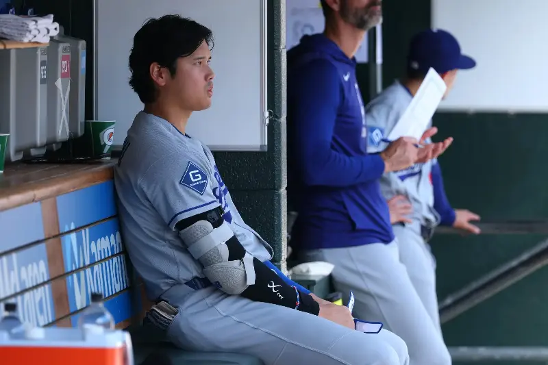 Shohei Ohtani #17 of the Los Angeles Dodgers looks on from the dugout in the second inning while playing the Detroit Tigers at Comerica Park on August 29, 2026 in Detroit, Michigan. (Photo by Gregory Shamus/Getty Images)