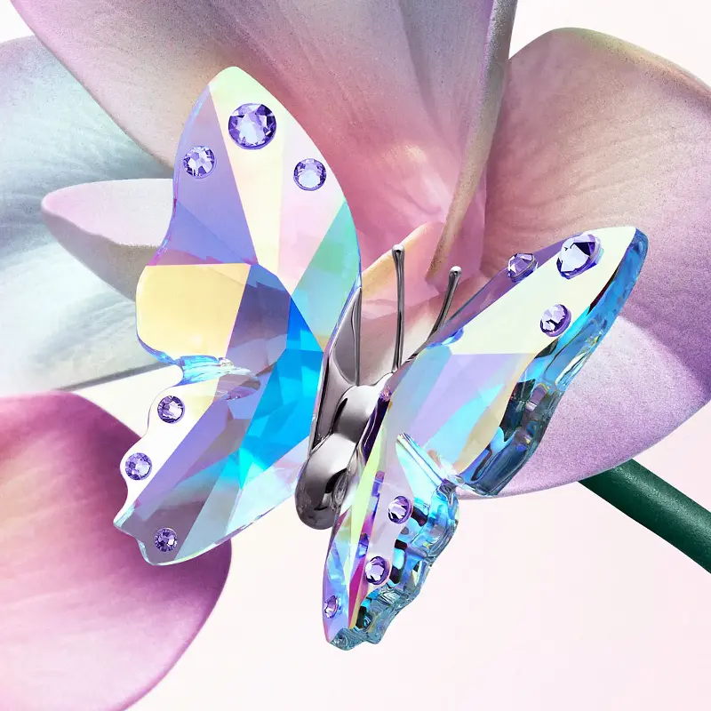 Butterfly with crystallised wings in the Aurora Boreale effect.