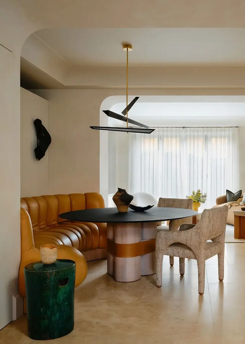 When used as an accent to neutral walls, ochre makes a statement without overwhelming the room with too much color.  (Image credit: Dean Hearne. Design: OWN LONDON)