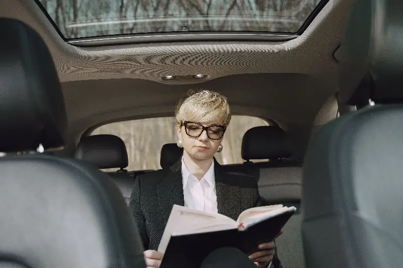 Motion sickness while reading in a moving car occurs primarily because of a mismatch between the sensory signals received by the brain. 
