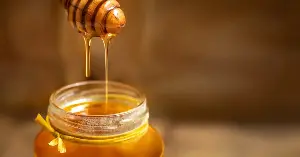 Honey is so hostile to bacteria that hospitals keep a sterilised, medical-grade version on hand for stubborn wounds and burns — the same chemistry that let honey in ancient tombs stay edible for millennia now helps modern skin heal