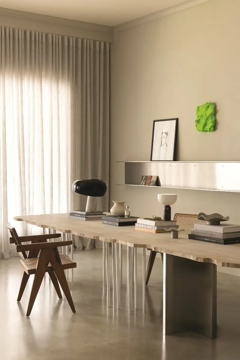 The edge of this travertine table was drawn by hand and then cut.  (Image credit: Timothy Kaye. Design: Adyn Kelly)
