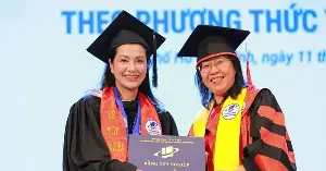 Who is the Vietnamese supermodel who graduated with honors in law and became a CEO at the age of 46?