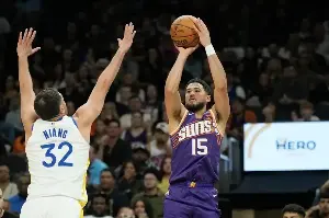 Booker scores 43 points in Suns' 131-122 win over Warriors