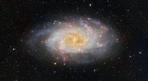 JWST resolved a galaxy from 800 million years after the Big Bang while NEO Surveyor — the only NASA mission Congress has required by statute — remains roughly 30 years behind its city-killer catalog deadline, and the gap is a lesson in what makes a problem fundable inside the same agency
