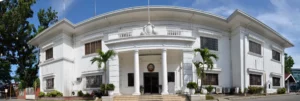 Exterior facade of Cagayan de Oro City Hall, where Mayor Rolando Uy has implemented a four-day compressed workweek for energy conservation.