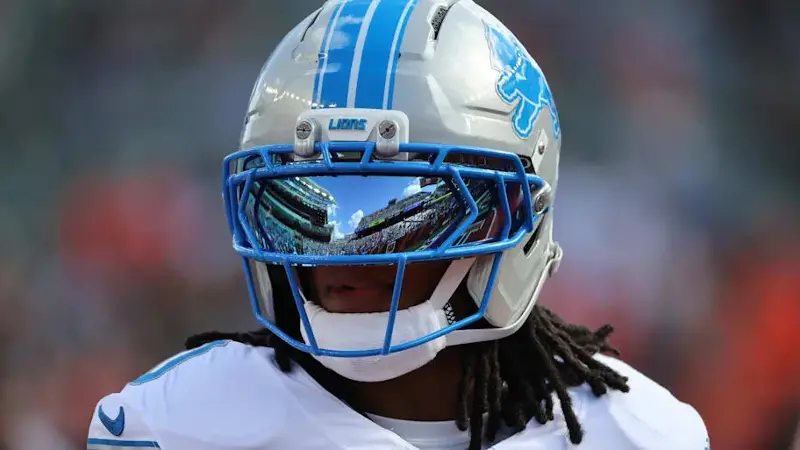 Gibbs warms up before a game against the Cincinnati Bengals at Paycor Stadium. 
