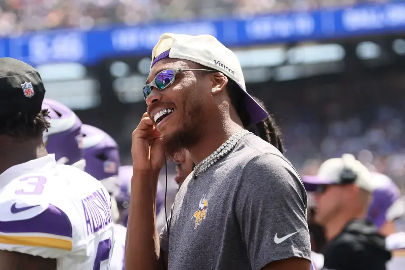 Justin Jefferson #18 of the Minnesota Vikings looks on from a sideline during a preseason game against the New York Giants at MetLife Stadium on August 15th, 2026 in East Rutherford, New Jersey. (Photo by Mike Coppola/Getty Images)