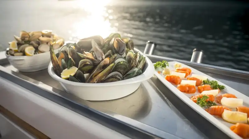 Aboard the Seafood Odyssea Cruise, one can try freshly-steamed greenshell mussels and freshly-grilled Regal Salmon. (Photo: Mike Heydon)