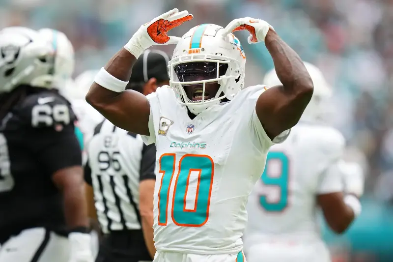 Tyreek Hill #10 of the Miami Dolphins reacts after a play in the first quarter of a game against the Las Vegas Raiders at Hard Rock Stadium on November 17, 2024 in Miami Gardens, Florida. (Photo by Rich Storry/Getty Images)