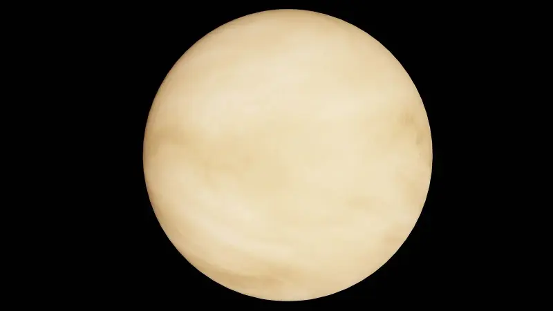 The planet Venus and its thick cloudy atmosphere against black space.