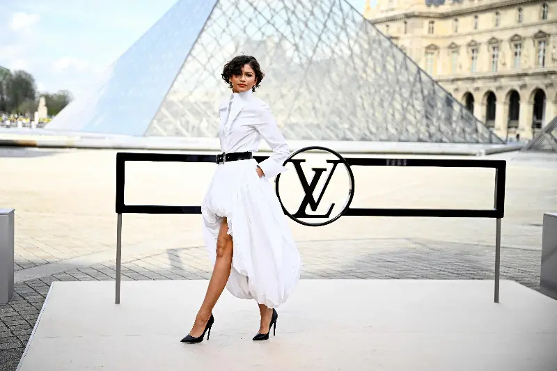 Zendaya poses with aplomb in her dress. 