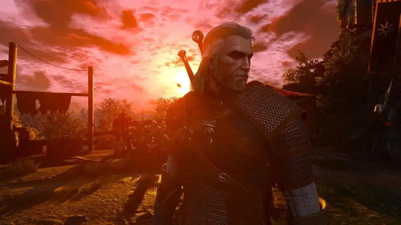 The Witcher 3 Remastered screenshot of Geralt with the sun setting behind him