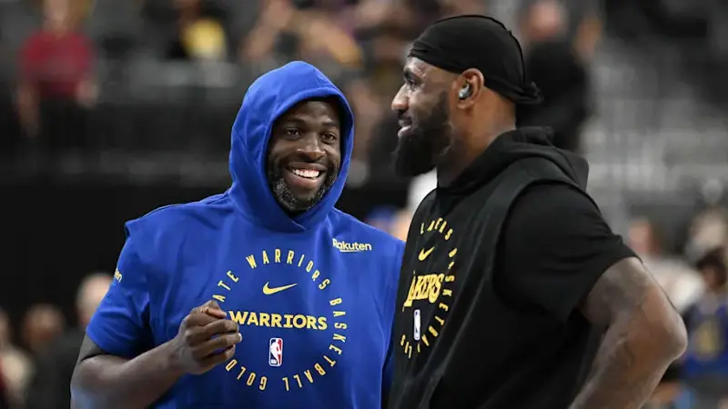 Golden State Warriors forward Draymond Green and Los Angeles Lakers forward LeBron James