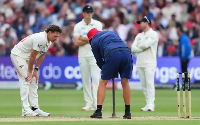 New Zealand’s Nathan Smith looks on as a groundsman flattens a foothold during the second day of the Lord’s Test match against England this summer - AP/Kirsty Wigglesworth