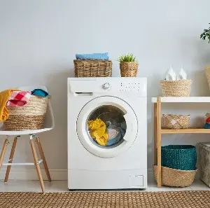 Why does my washing machine smell musty, and how to fix it easily at home?