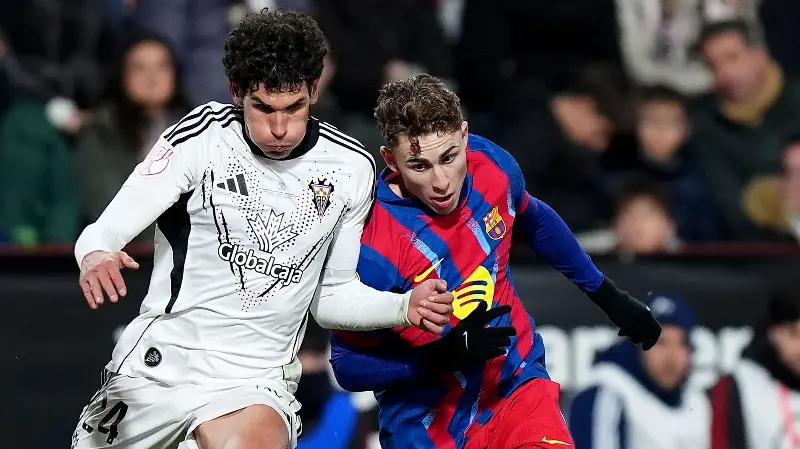 Suplentes y entrenador