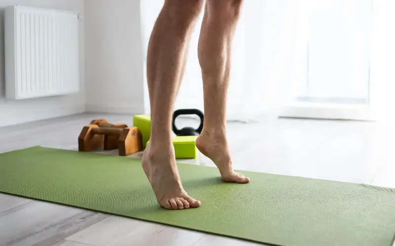 A standing calf raise is a simple and effective exercise to help maintain calf strength and function - iStockphoto/Zheka Boss