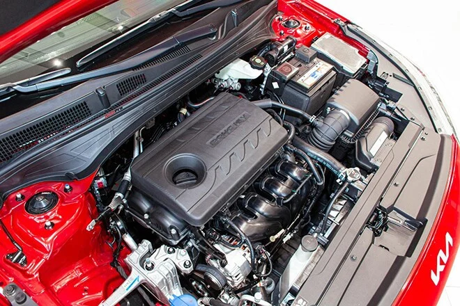 The interior of the Kia K3 GT version features a black and red color scheme.