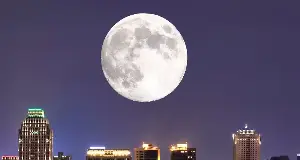 Why does the Moon always point its side towards the Earth?