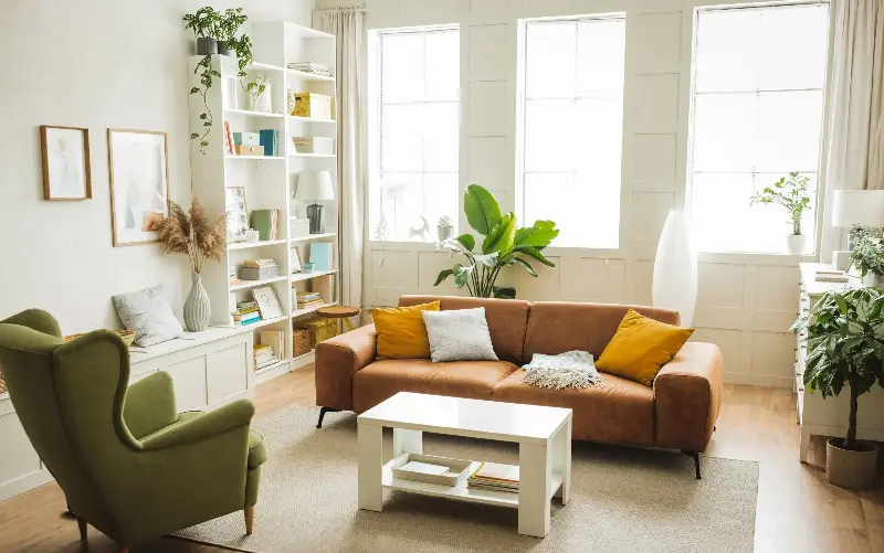 Bright winter sunlight can make living spaces look airy and inviting - svetikd/E+