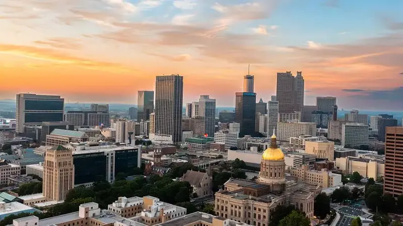 Atlanta Georgia State Capitol and city skyline aerial establishing shot