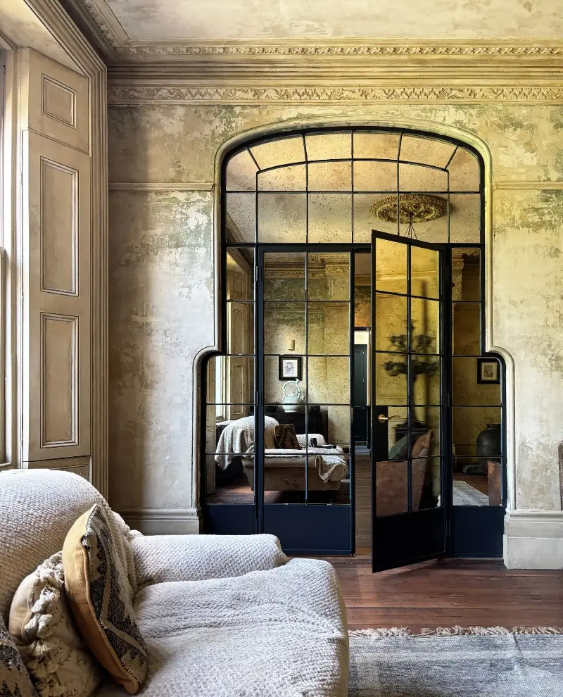 The painted wall finish asks the question of what authenticity really means.  (Image credit: Studio Sam Causer, Fabco)