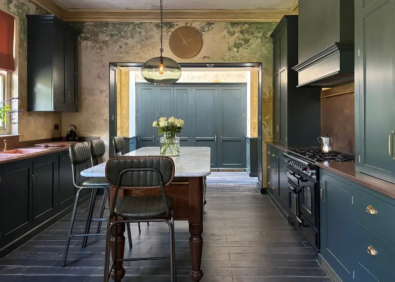 The detailed wall finish carries through to the kitchen, too.  (Image credit: Studio Sam Causer, DeVOL)