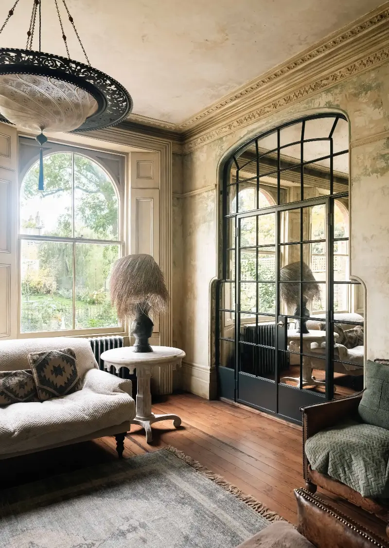 These custom doors from Fabco were made to fit the existing architectural opening, connecting this room to the kitchen.  (Image credit: Fabco, Studio Sam Causer)
