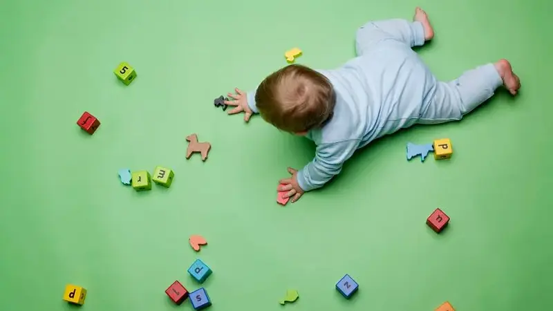 Baby with building blocks