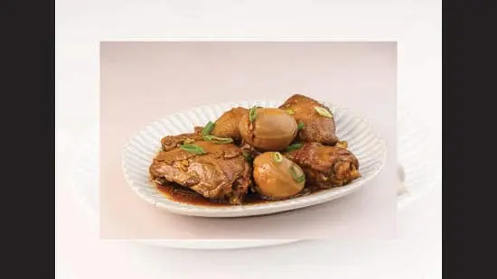 The sweet-sour Adobo is a Filipino cuisine staple, but Indians aren’t used to so much meat. (SHUTTERSTOCK)