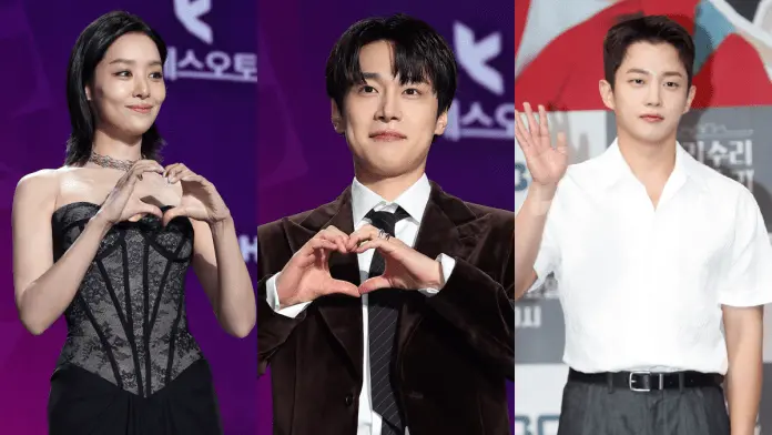 Cha Joo-young, Kang You-seok and Kim Min-seok posing for a photo: Cha Joo-young in a black dress making a heart shape with her hands, Kang You-seok in a brown suit also forming a heart with his hands, and Kim Min-seok in a white shirt waving.