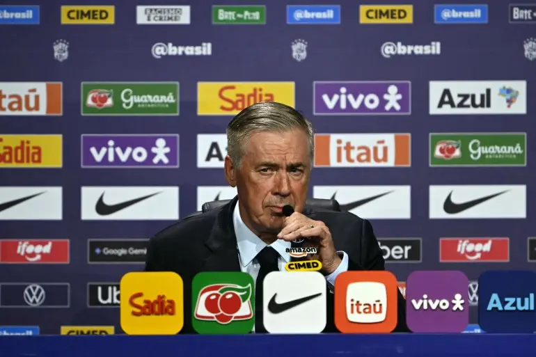 Brazil's football team head coach Carlo Ancelotti speaks during an event to announce Brazil's squad for the 2026 FIFA World Cup at the Museum of Tomorrow, in downtown Rio de Janeiro, Brazil, on May 18, 2026. (Photo by Mauro PIMENTEL / AFP)