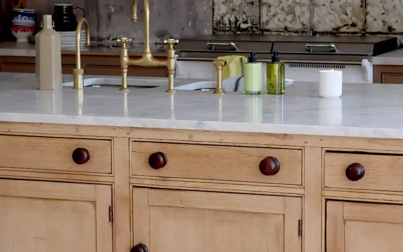 The kitchen is designed around a 9ft Victorian pine dresser base
