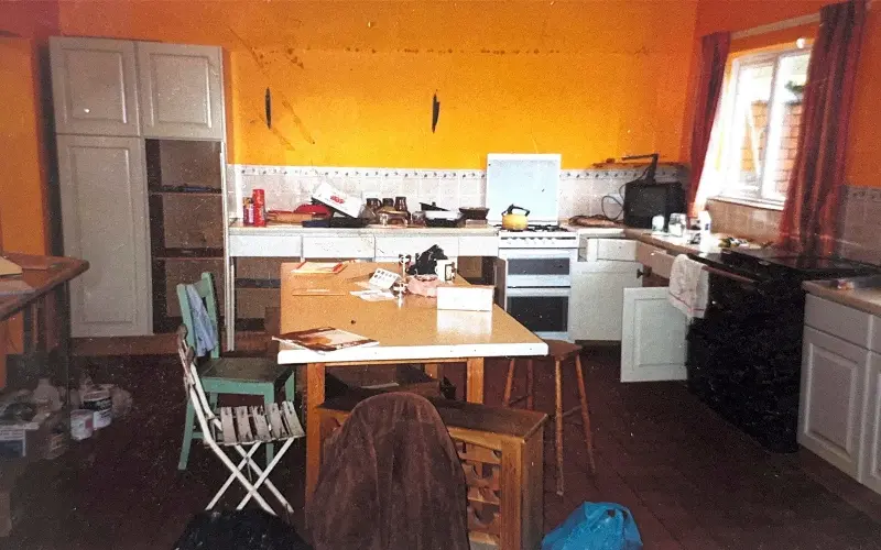 When the couple moved in, the house had ‘a pretty shabby fitted kitchen’ (photographed in 2003)