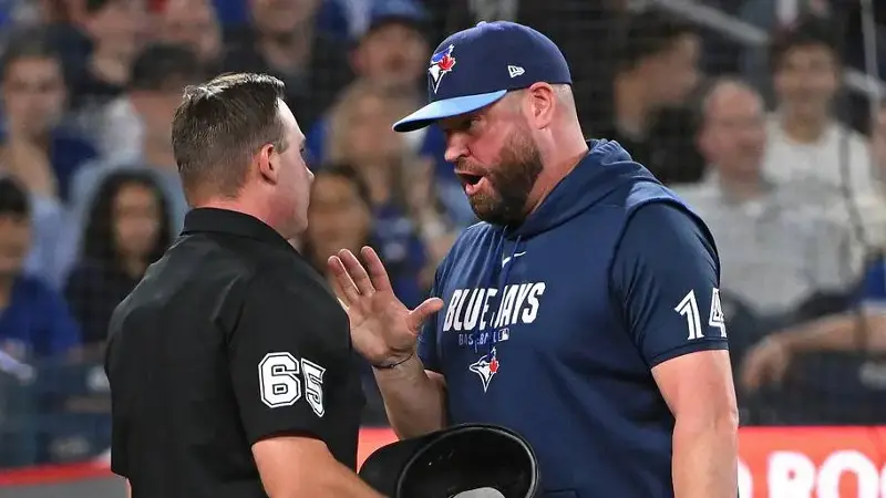 Toronto Blue Jays manager John Schneider argues a balk call with home plate umpire Steven Jaschinski 