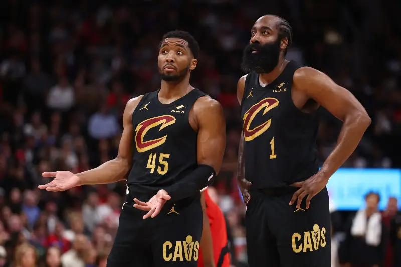 Donovan Mitchell #45 and James Harden #1 of the Cleveland Cavaliers react against the Toronto Raptors during the fourth quarter in Game Six of the First Round of the NBA Eastern Conference Playoffs at Scotiabank Arena on May 01, 2026 in Toronto, Ontario, Canada. NOTE TO USER: User expressly acknowledges and agrees that, by downloading and or using this photograph, User is consenting to the terms and conditions of the Getty Images License Agreement. (Photo by Cole Burston/Getty Images)