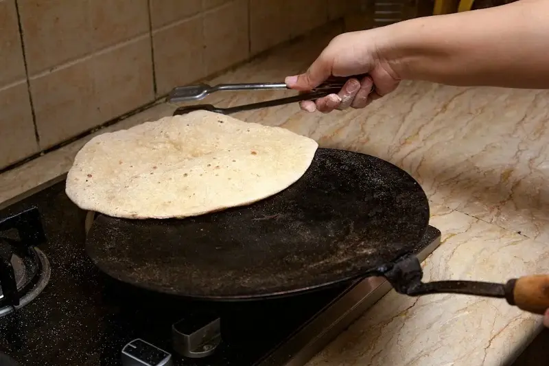 Your dough may be lacking adequate moisture if your roti turns hard.