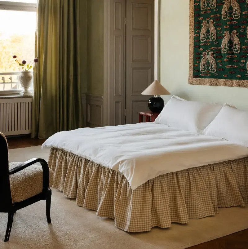 A patterned bed skirt will elevate a bland bed frame - Mille Notti