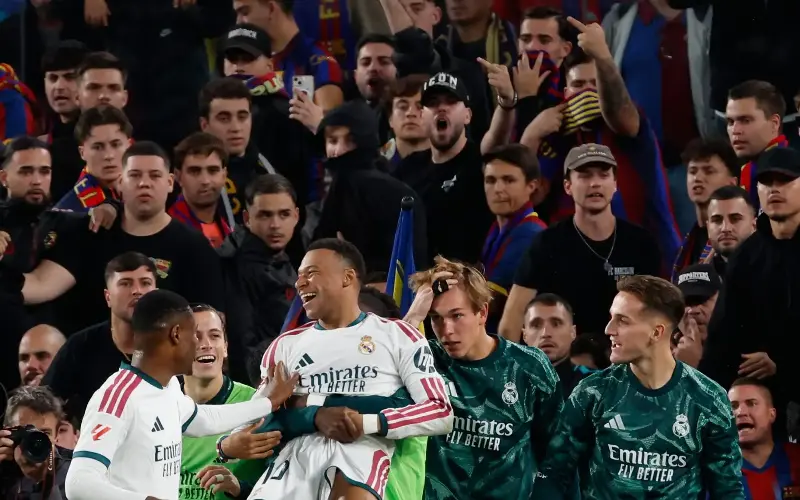 Metres from the Barcelona fans, Mbappe celebrates scoring the winning goal - AP /Joan Montfort