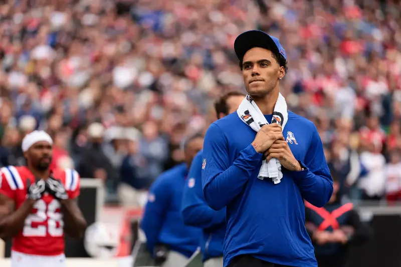 Christian Gonzalez #0 of the New England Patriots stands on the sideline during the national anthem prior to the game against the Las Vegas Raiders at Gillette Stadium on October 11, 2026 in Foxborough, Massachusetts. (Photo by Kathryn Riley/Getty Images)