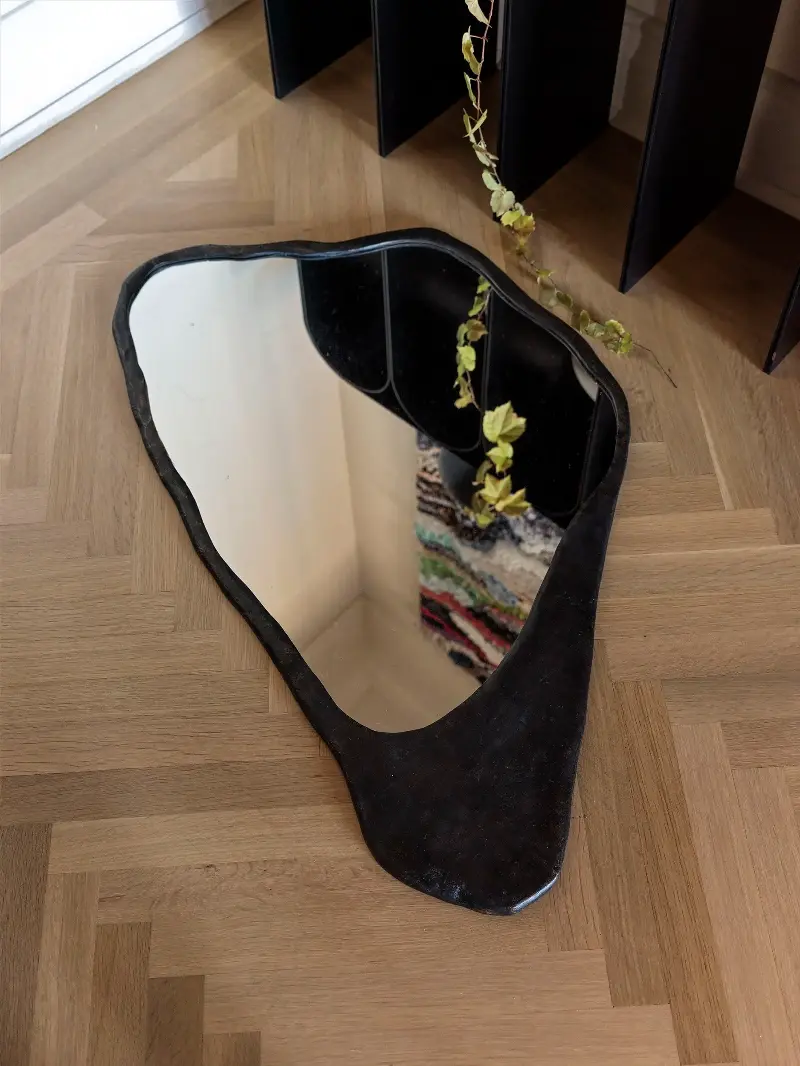 A mirror looks back up at the artwork above. (Image credit: Chris Mottalini. Design: Crina Arghirescu Rogard.)