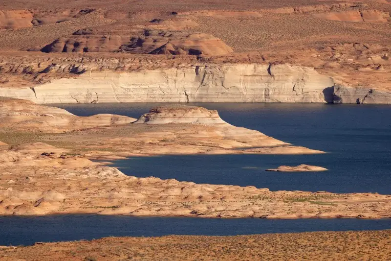 Land and geologic formations that have been underwater since the 1960s, when Lake Powell was created, reemerge for the first time while record low water levels continue to drop on September 3 near Page, Arizona.