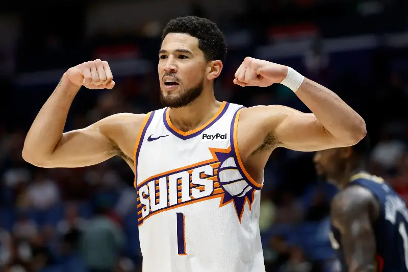 NEW ORLEANS, LOUISIANA - DECEMBER 27: Devin Booker #1 of the Phoenix Suns reacts during the second half of a game against the New Orleans Pelicans at Smoothie King Center on December 27, 2025 in New Orleans, Louisiana. (Photo by Tyler Kaufman/Getty Images)